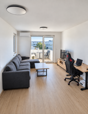 Svetlý 2-izbový byt s balkónom a garážovým státím v projekte RNDZ - fotografia 3